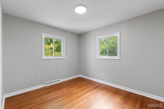 6714 Sandy Hill Dr, Hazelwood, MO 63042 - spare room featuring healthy amount of natural light, baseboards, and light wood-style flooring