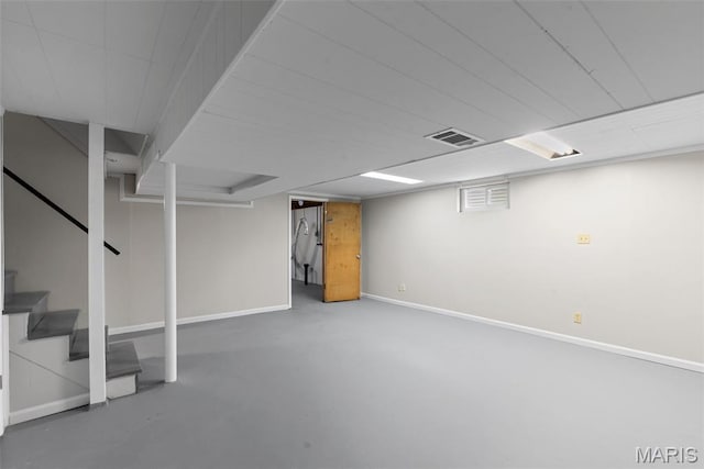 6714 Sandy Hill Dr, Hazelwood, MO 63042 - finished below grade area featuring baseboards and stairway