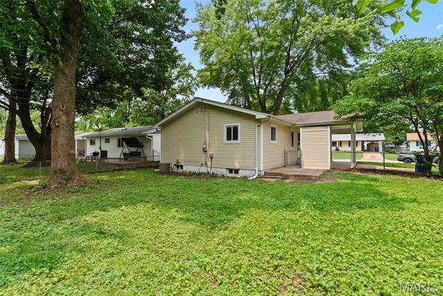 6714 Sandy Hill Dr, Hazelwood, MO 63042 - back of property with central AC unit
