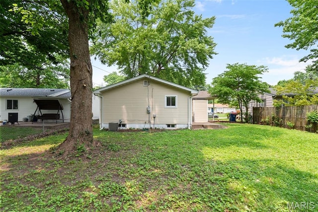 6714 Sandy Hill Dr, Hazelwood, MO 63042 - back of property with cooling unit