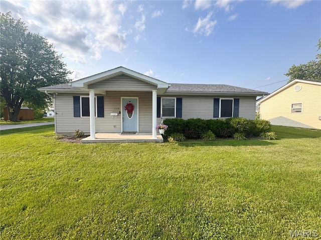 1319 W Church St, Bowling Green, MO 63334 - view of front facade with a front lawn and covered porch
