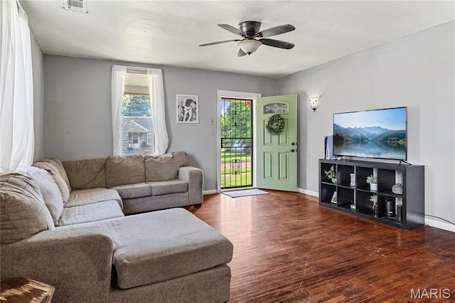 330 Elliott Ave, Chaffee, MO 63740 - living area featuring wood finished floors, ceiling fan, and baseboards