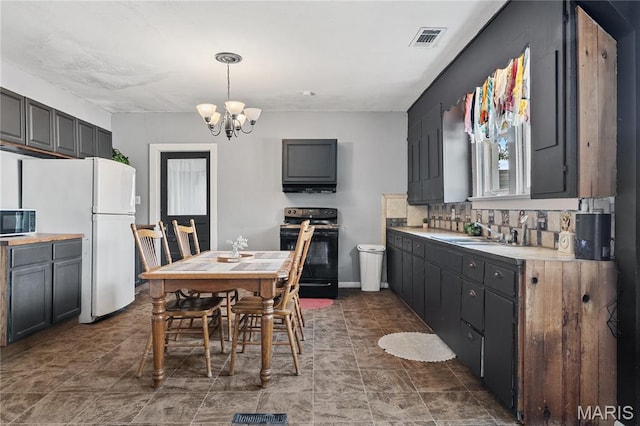 330 Elliott Ave, Chaffee, MO 63740 - dining space featuring a chandelier