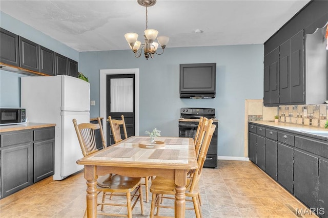 330 Elliott Ave, Chaffee, MO 63740 - dining space featuring a chandelier