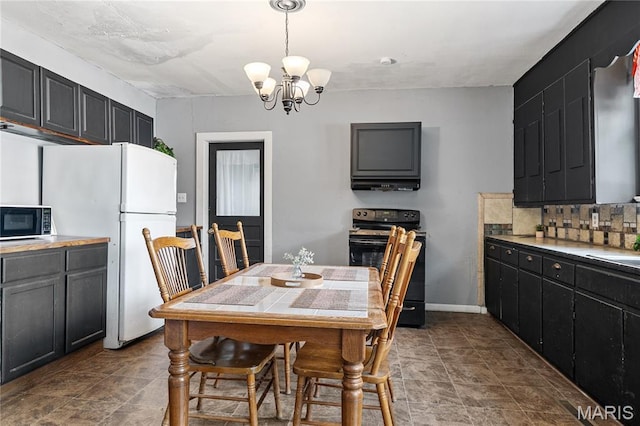 330 Elliott Ave, Chaffee, MO 63740 - dining room with a chandelier
