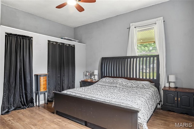 330 Elliott Ave, Chaffee, MO 63740 - bedroom with wood finished floors and a ceiling fan
