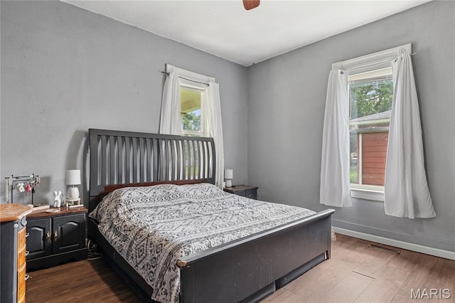330 Elliott Ave, Chaffee, MO 63740 - bedroom with wood finished floors and baseboards