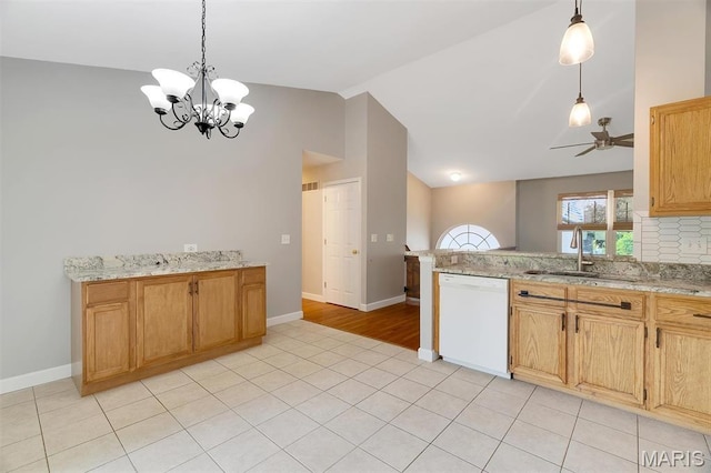 612 Hill Dr, Eureka, MO 63025 - kitchen with white dishwasher, vaulted ceiling, a chandelier, a ceiling fan, and decorative light fixtures