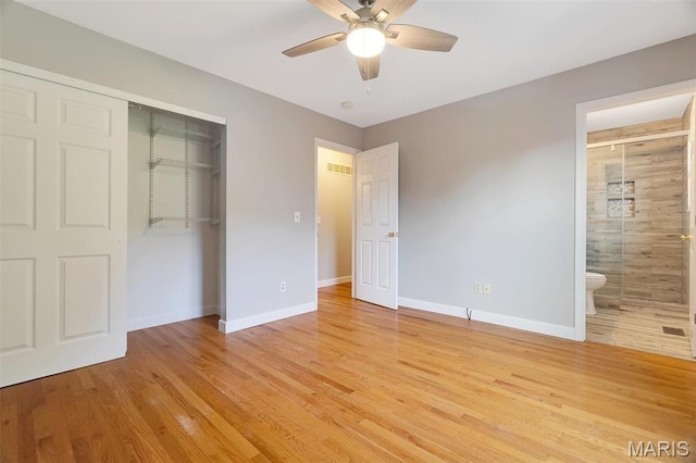 612 Hill Dr, Eureka, MO 63025 - unfurnished bedroom with a closet, light wood-style flooring, ensuite bath, and ceiling fan