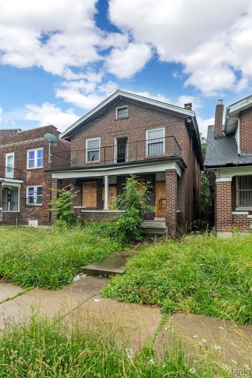 5104 Thekla Ave, Saint Louis, MO 63115 - view of front of house featuring brick siding