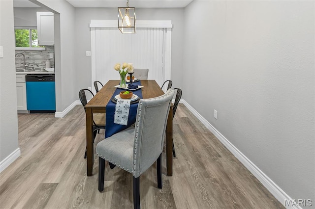 2012 Maple Tree Ln, Cahokia, IL 62206 - dining area featuring light wood finished floors and baseboards