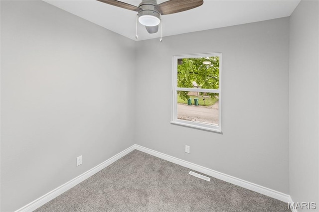 2012 Maple Tree Ln, Cahokia, IL 62206 - empty room with carpet floors, baseboards, and ceiling fan