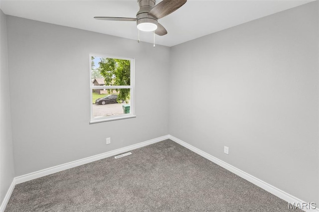 2012 Maple Tree Ln, Cahokia, IL 62206 - unfurnished room featuring carpet flooring, baseboards, and a ceiling fan