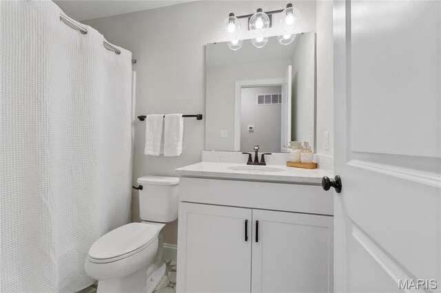 7405 Shadow Point Dr, Saint Louis, MO 63129 - bathroom with toilet, vanity, and a shower with curtain