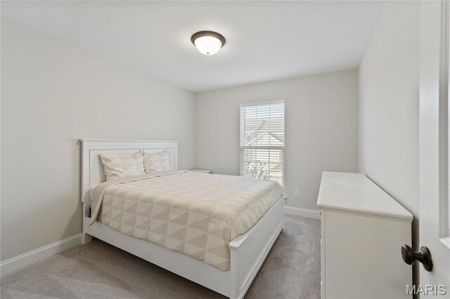 7405 Shadow Point Dr, Saint Louis, MO 63129 - bedroom featuring carpet floors and baseboards