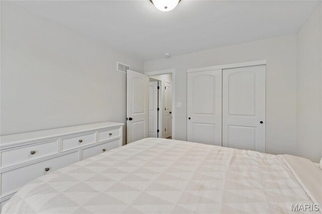 7405 Shadow Point Dr, Saint Louis, MO 63129 - bedroom featuring a closet