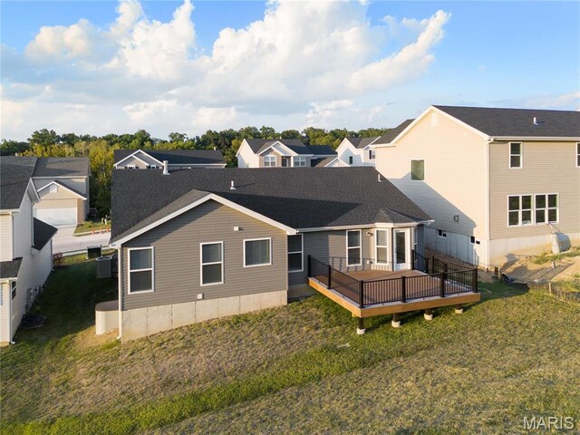 7405 Shadow Point Dr, Saint Louis, MO 63129 - rear view of property with a deck, a lawn, a residential view, and central air condition unit