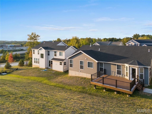 7405 Shadow Point Dr, Saint Louis, MO 63129 - back of property featuring a deck, a yard, and a residential view