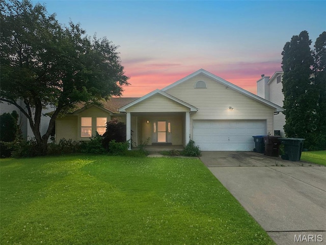 135 Misty View Ln, Saint Peters, MO 63376 - view of front of house with a garage, driveway, a lawn, and covered porch
