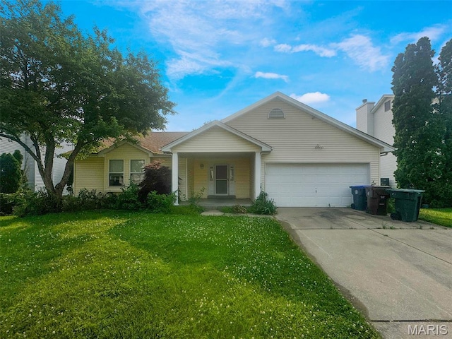 135 Misty View Ln, Saint Peters, MO 63376 - view of front of house with an attached garage, concrete driveway, a front yard, and a porch
