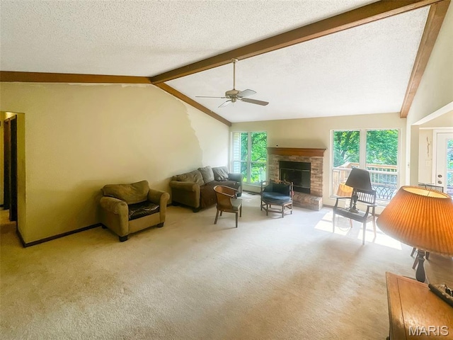135 Misty View Ln, Saint Peters, MO 63376 - carpeted living area featuring a ceiling fan, healthy amount of natural light, and a brick fireplace