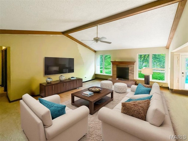 135 Misty View Ln, Saint Peters, MO 63376 - carpeted living room featuring ceiling fan, baseboards, and a fireplace with raised hearth