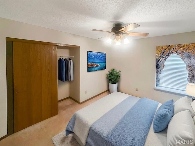 135 Misty View Ln, Saint Peters, MO 63376 - bedroom featuring light colored carpet, a closet, a textured ceiling, and ceiling fan