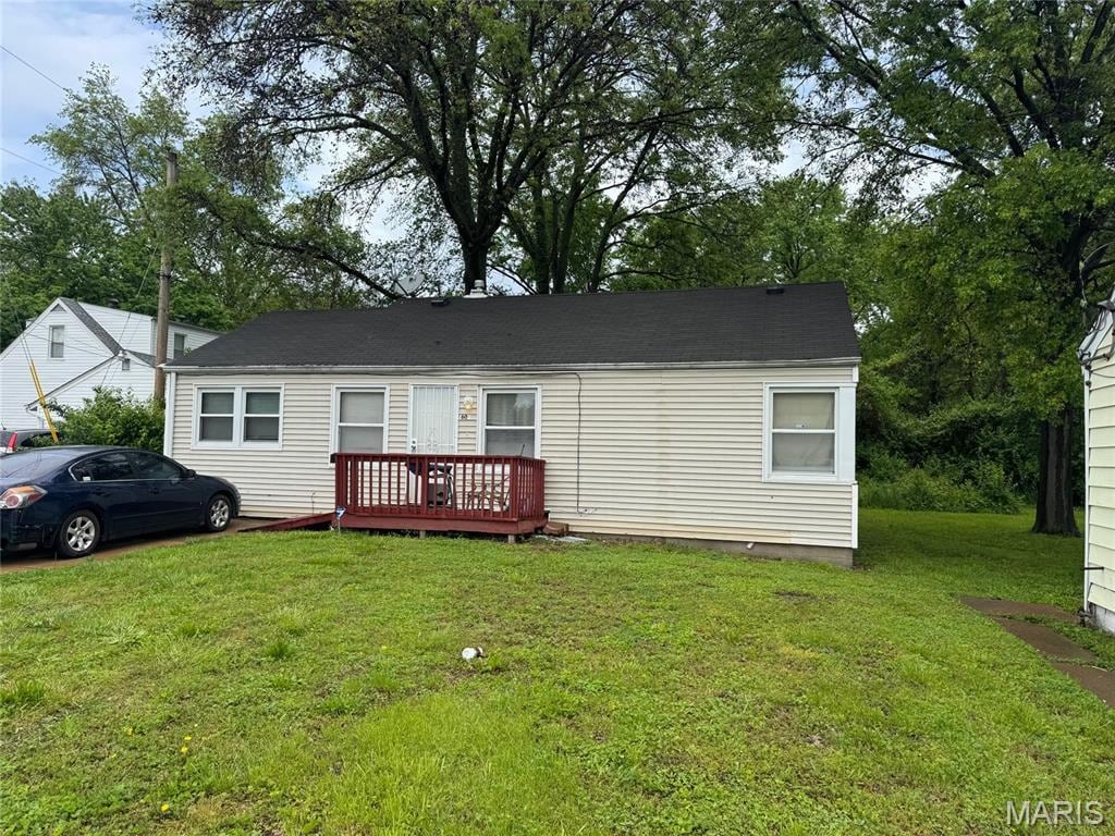 601 Ferguson Ave, Saint Louis, MO 63135 - view of front of property with a wooden deck and a front yard
