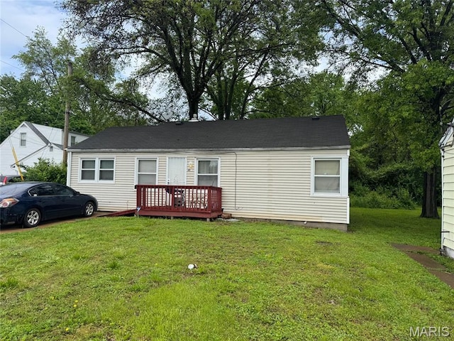601 Ferguson Ave, Saint Louis, MO 63135 - view of front of property with a wooden deck and a front yard