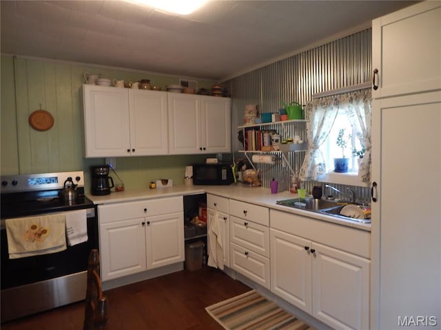1620 W Centennial Ave, Bowling Green, MO 63334 - kitchen with electric stove, black microwave, a sink, white cabinets, and dark wood-type flooring