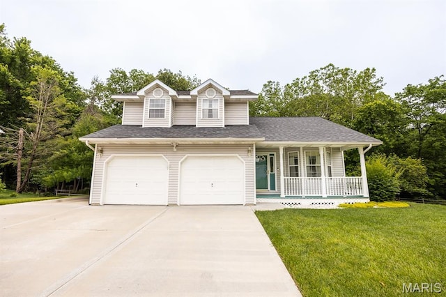 608 Andra Dr, Maryville, IL 62062 - view of front of property with covered porch, a garage, a front lawn, driveway, and a shingled roof