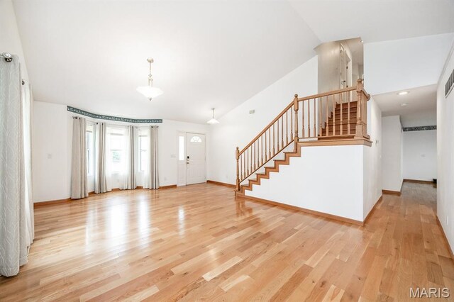 608 Andra Dr, Maryville, IL 62062 - foyer entrance featuring stairway, light wood-type flooring, and baseboards