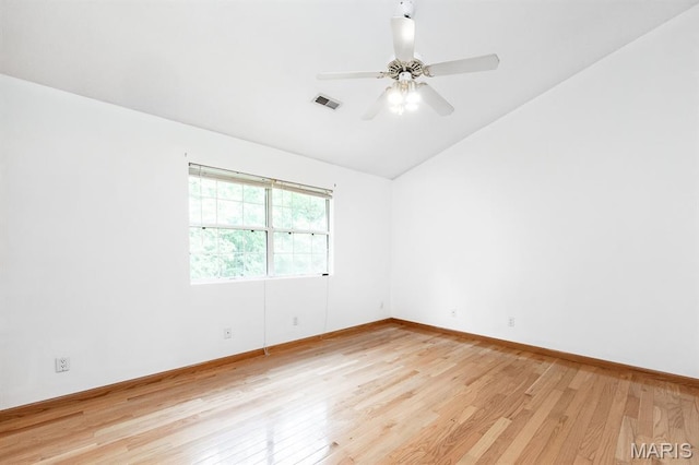 608 Andra Dr, Maryville, IL 62062 - empty room featuring light wood finished floors, lofted ceiling, a ceiling fan, and baseboards