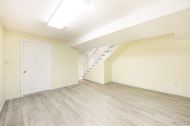 608 Andra Dr, Maryville, IL 62062 - finished basement featuring stairway, light wood-style flooring, and baseboards
