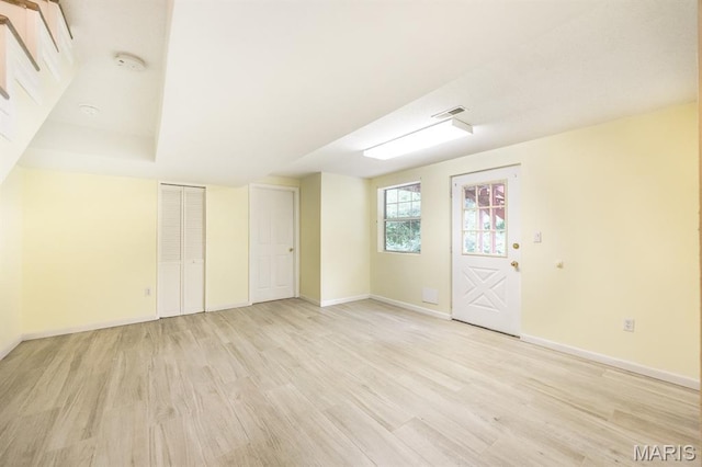 608 Andra Dr, Maryville, IL 62062 - below grade area featuring light wood-style floors and baseboards