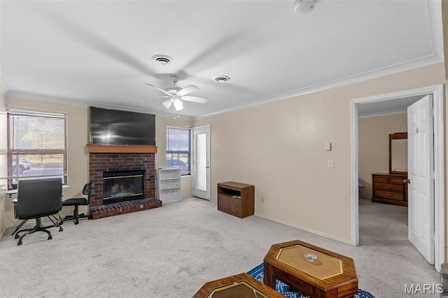 2339 Kratky Rd Unit A, Saint Louis, MO 63114 - carpeted living area featuring crown molding, a brick fireplace, a ceiling fan, baseboards, and an office area
