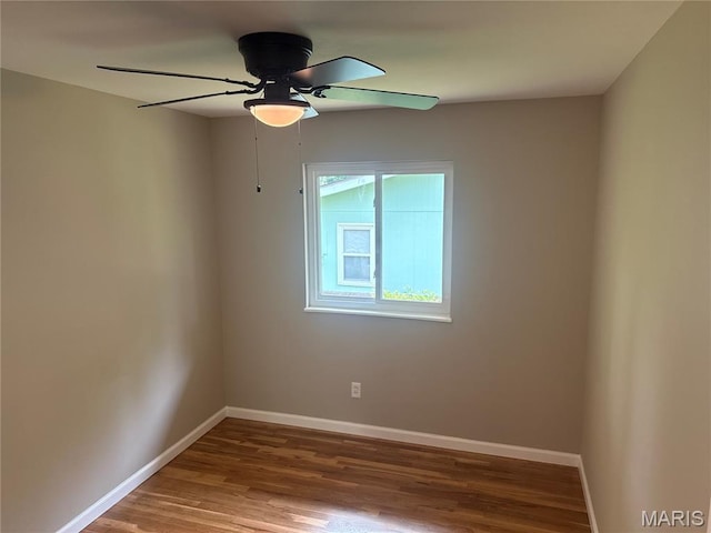 2542 Dukeland Dr, Ferguson Township, MO 63136 - unfurnished room with wood finished floors, baseboards, and a ceiling fan