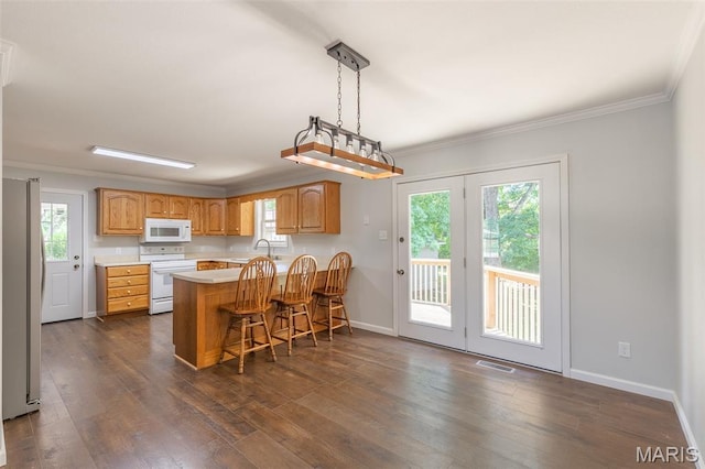 3936 State Highway 142, Doniphan, MO 63935 - kitchen with white appliances, a peninsula, crown molding, light countertops, and baseboards