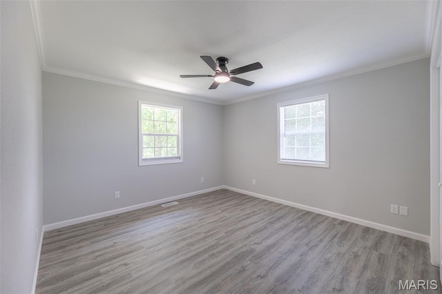 3936 State Highway 142, Doniphan, MO 63935 - unfurnished room with wood finished floors, crown molding, a ceiling fan, and baseboards