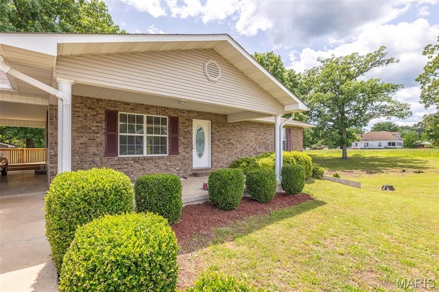 3936 State Highway 142, Doniphan, MO 63935 - view of front facade with a front lawn, a porch, and brick siding