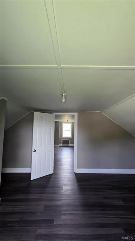 923 S High St, Belleville, IL 62220 - bonus room with dark wood-style flooring and vaulted ceiling