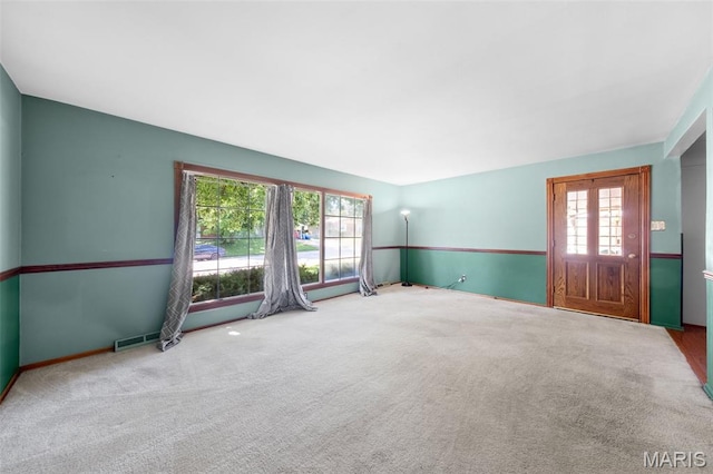 417 Concordia Ln, Saint Charles, MO 63301 - unfurnished living room with carpet