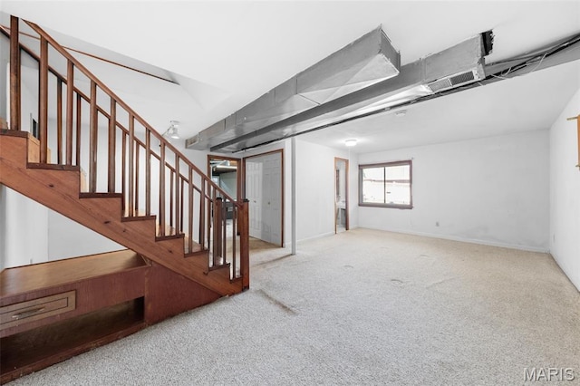 417 Concordia Ln, Saint Charles, MO 63301 - below grade area with carpet and stairway