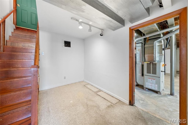 417 Concordia Ln, Saint Charles, MO 63301 - below grade area with heating unit, stairway, and carpet