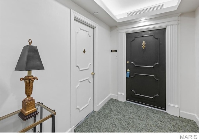 710 S Hanley Rd Unit 10A, Clayton, MO 63105 - foyer entrance with baseboards