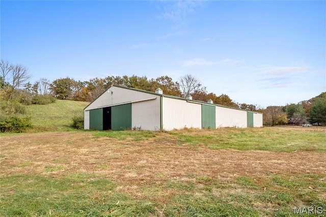 2745 Zingg Rd, Millstadt, IL 62260 - view of pole building featuring a yard