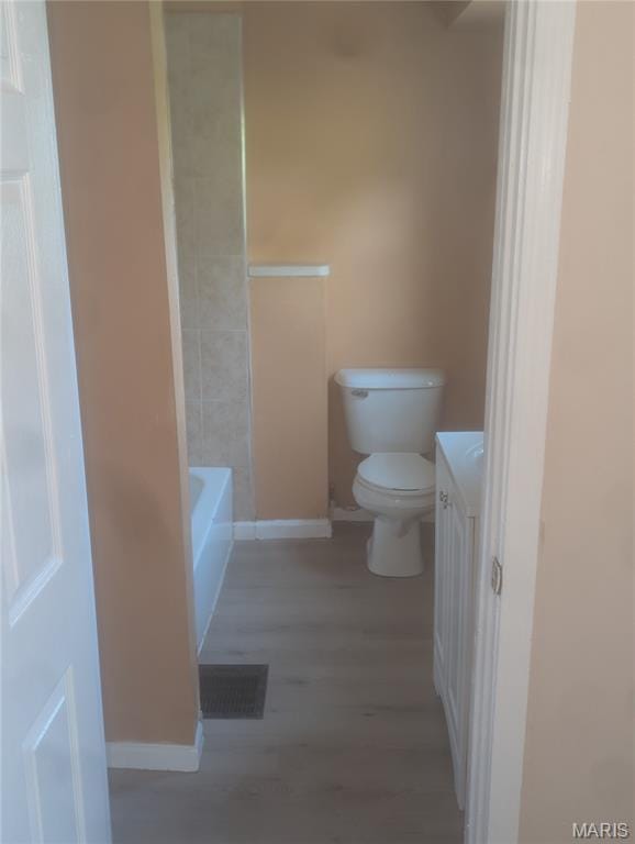4737 Beacon Ave, Saint Louis, MO 63120 - full bath with vanity and wood finished floors