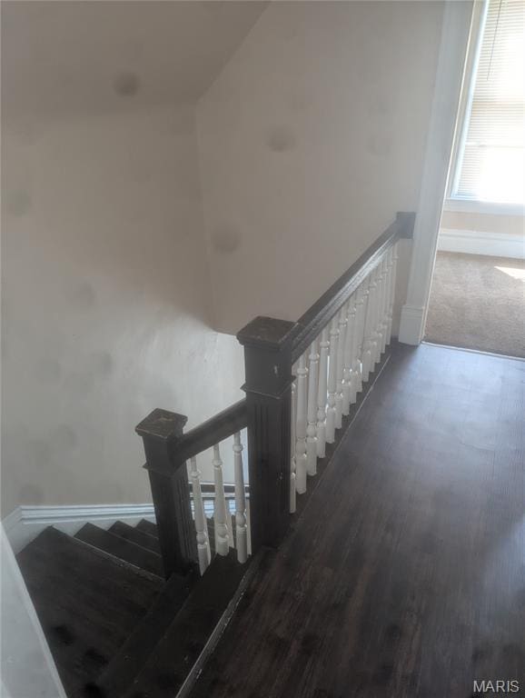 4737 Beacon Ave, Saint Louis, MO 63120 - stairs featuring baseboards and wood finished floors