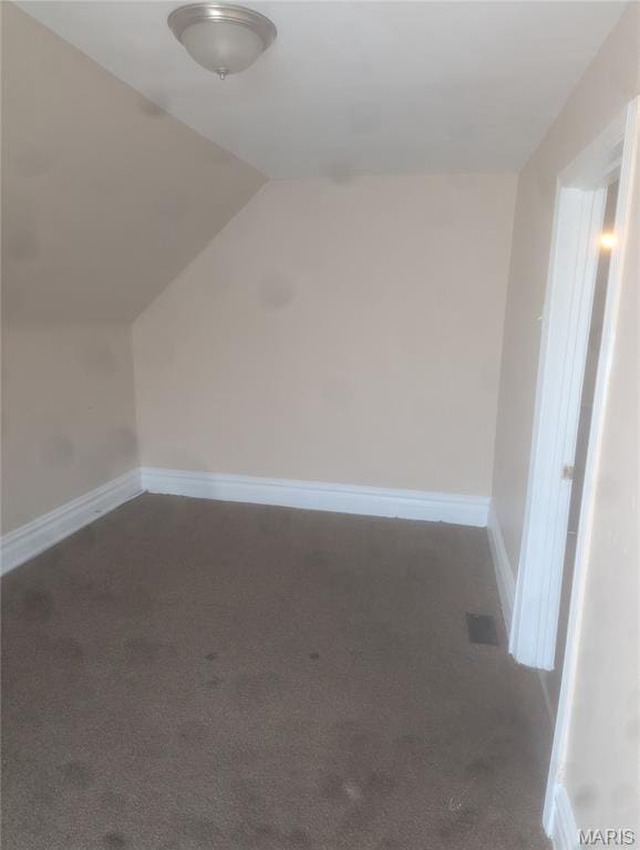 4737 Beacon Ave, Saint Louis, MO 63120 - additional living space featuring carpet floors and lofted ceiling