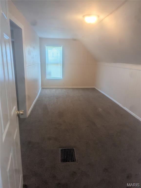 4737 Beacon Ave, Saint Louis, MO 63120 - bonus room with carpet and vaulted ceiling